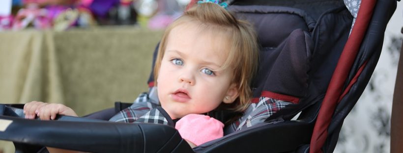 baby on jogging stroller